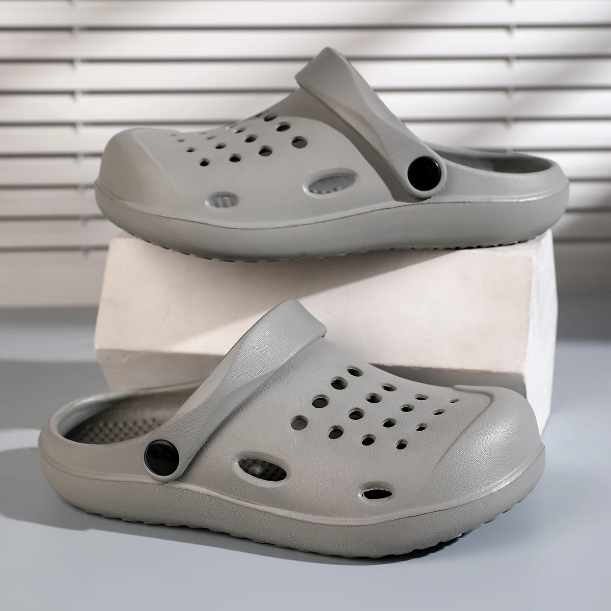 A pair of children's summer slip-on shoes with hole designs, EVA anti-slip soft soles, with a rounded toe and sandals MDH-7001
A pair of children's summer slip-on shoes with hole designs, EVA anti-slip soft soles, with a rounded toe and sandals MDH-7001