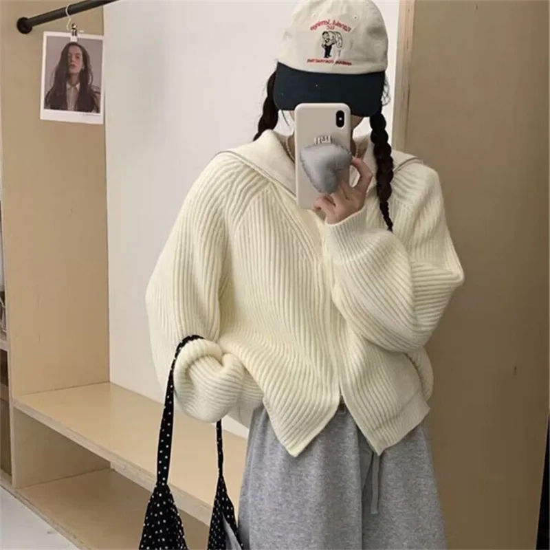 Lazy wind cardigan women's knitted top versatile autumn and winter small short loose wear navy collar sweater jacket
Lazy wind cardigan women's knitted top versatile autumn and winter small short loose wear navy collar sweater jacket