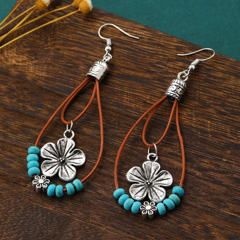 Vintage ethnic style simple turquoise bead flower women's earrings Bohemian niche design accessories
Vintage ethnic style simple turquoise bead flower women's earrings Bohemian niche design accessories
