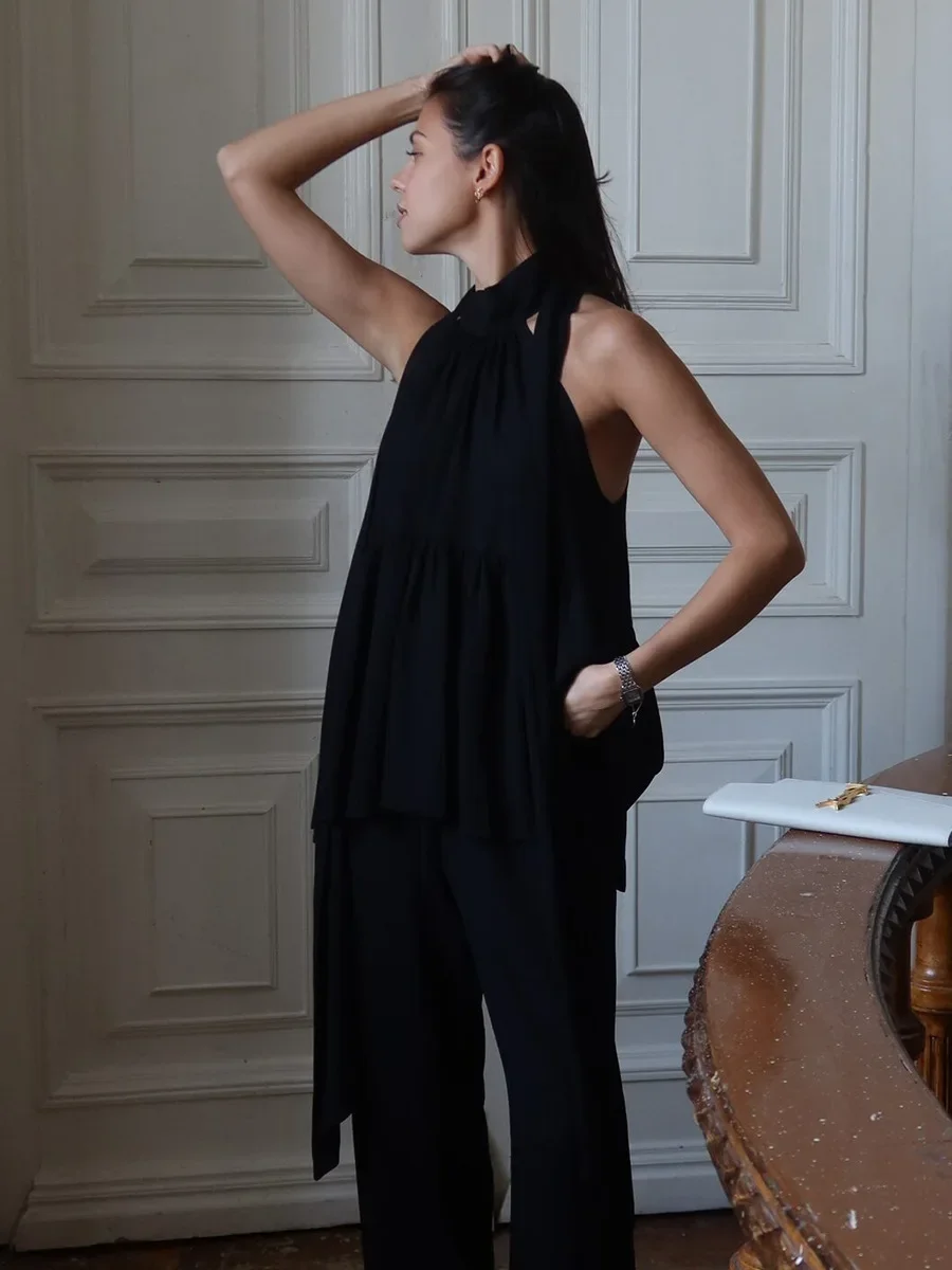 Sumuyoo 2026 spring and summer new black halter neck vest female loose off-shoulder ribbon long sleeveless top
Sumuyoo 2026 spring and summer new black halter neck vest female loose off-shoulder ribbon long sleeveless top