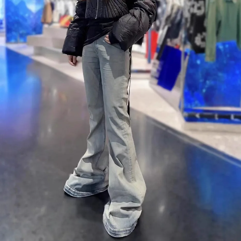 Rick Ro distressed blue washed wide-leg flared slim-fit floor-length wrinkled cat tail denim pants for men and women
Rick Ro distressed blue washed wide-leg flared slim-fit floor-length wrinkled cat tail denim pants for men and women