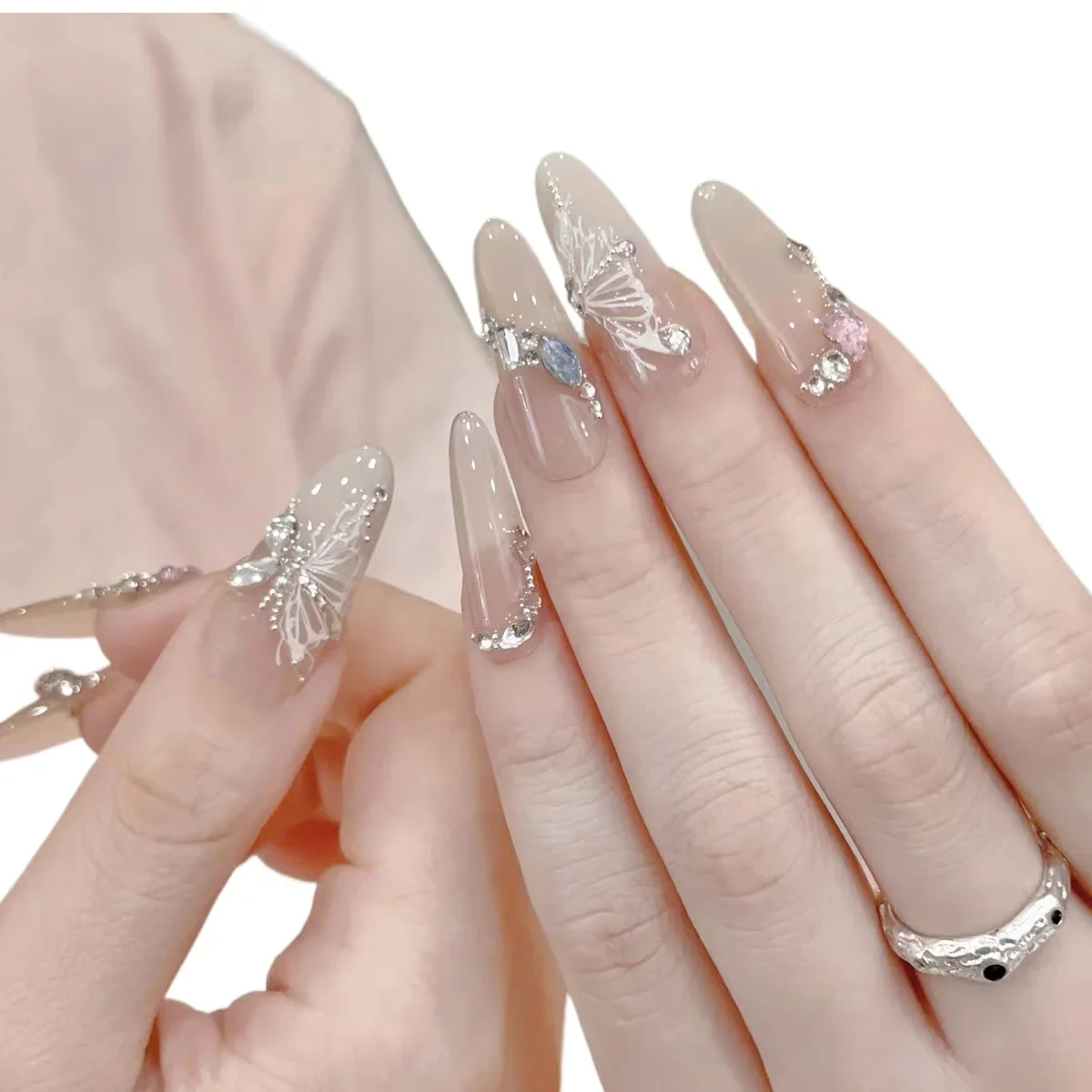 *Ice through butterfly handmade manicure wearing diamond flash fake nails bride advanced sense wearing long nail
*Ice through butterfly handmade manicure wearing diamond flash fake nails bride advanced sense wearing long nail