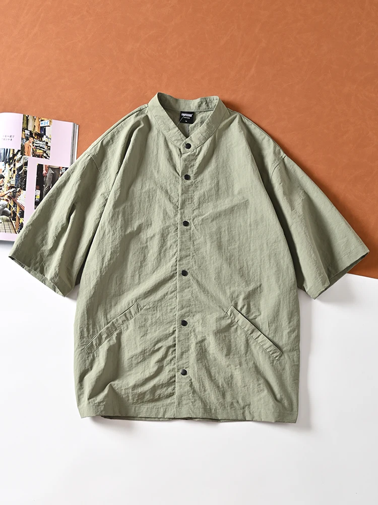 Loose Casual Short Sleeve Shirt Stand Collar Quick Dry Summer Men's Style Outdoor Fashion Thin Youth Popular Pure Color
Loose Casual Short Sleeve Shirt Stand Collar Quick Dry Summer Men's Style Outdoor Fashion Thin Youth Popular Pure Color