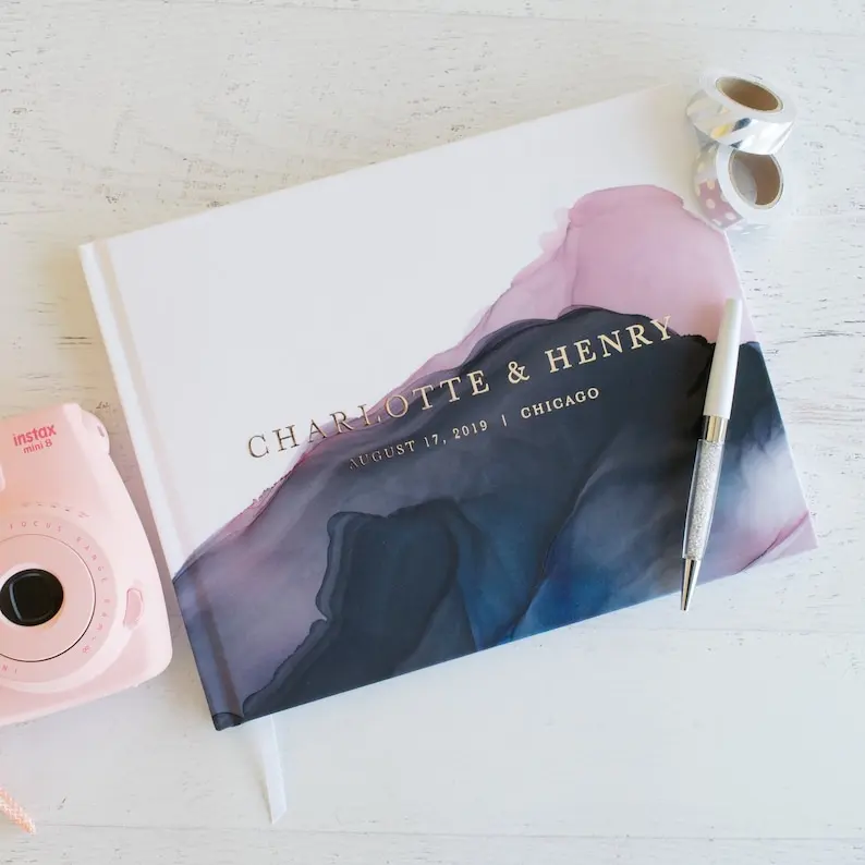 Wedding Guest Book with Foil Accents and Stunning Navy and Pink Watercolor Wash Personalized
Wedding Guest Book with Foil Accents and Stunning Navy and Pink Watercolor Wash Personalized