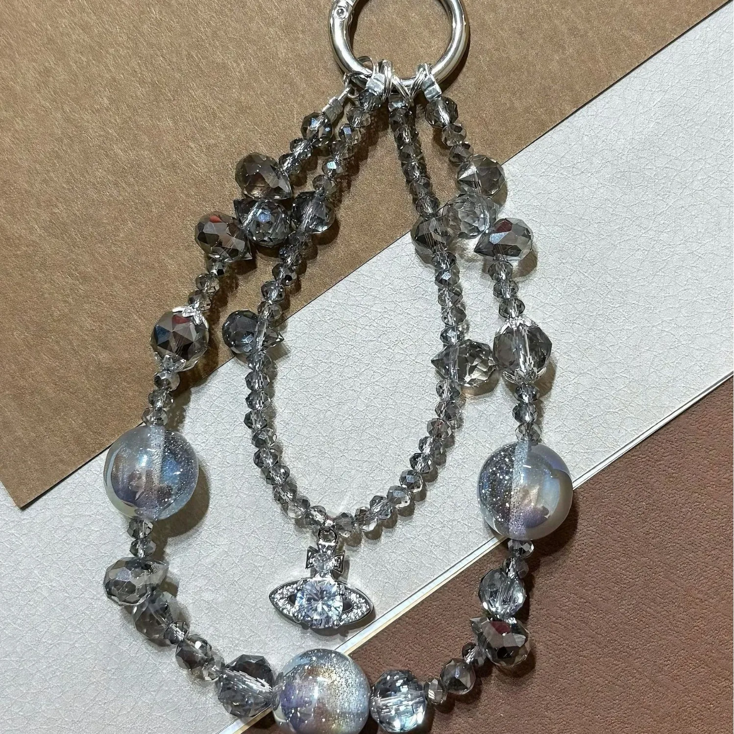 Luxury Grey Galaxy Crystal Beaded Phone Lanyard Zircon Planet Pendant Wrist Strap Aesthetic Double Layer Phone Charm for Women
Luxury Grey Galaxy Crystal Beaded Phone Lanyard Zircon Planet Pendant Wrist Strap Aesthetic Double Layer Phone Charm for Women