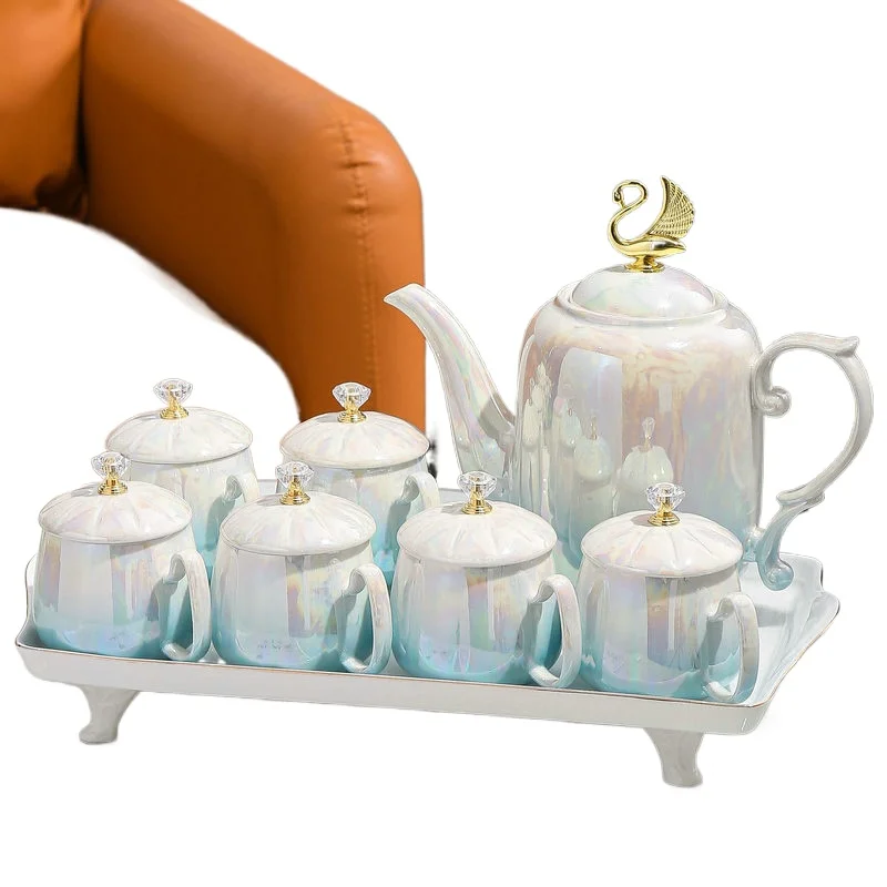 Light luxury kettle housewarming cup set, household living room ceramic water cup family
Light luxury kettle housewarming cup set, household living room ceramic water cup family