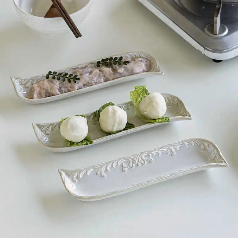 Винтажные рельефные керамические тарелки Dim Sum, простая прямоугольная ежедневная тарелка для суши, бытовая высококачественная десертная посуда
Винтажные рельефные керамические тарелки Dim Sum, простая прямоугольная ежедневная тарелка для суши, бытовая высококачественная десертная посуда