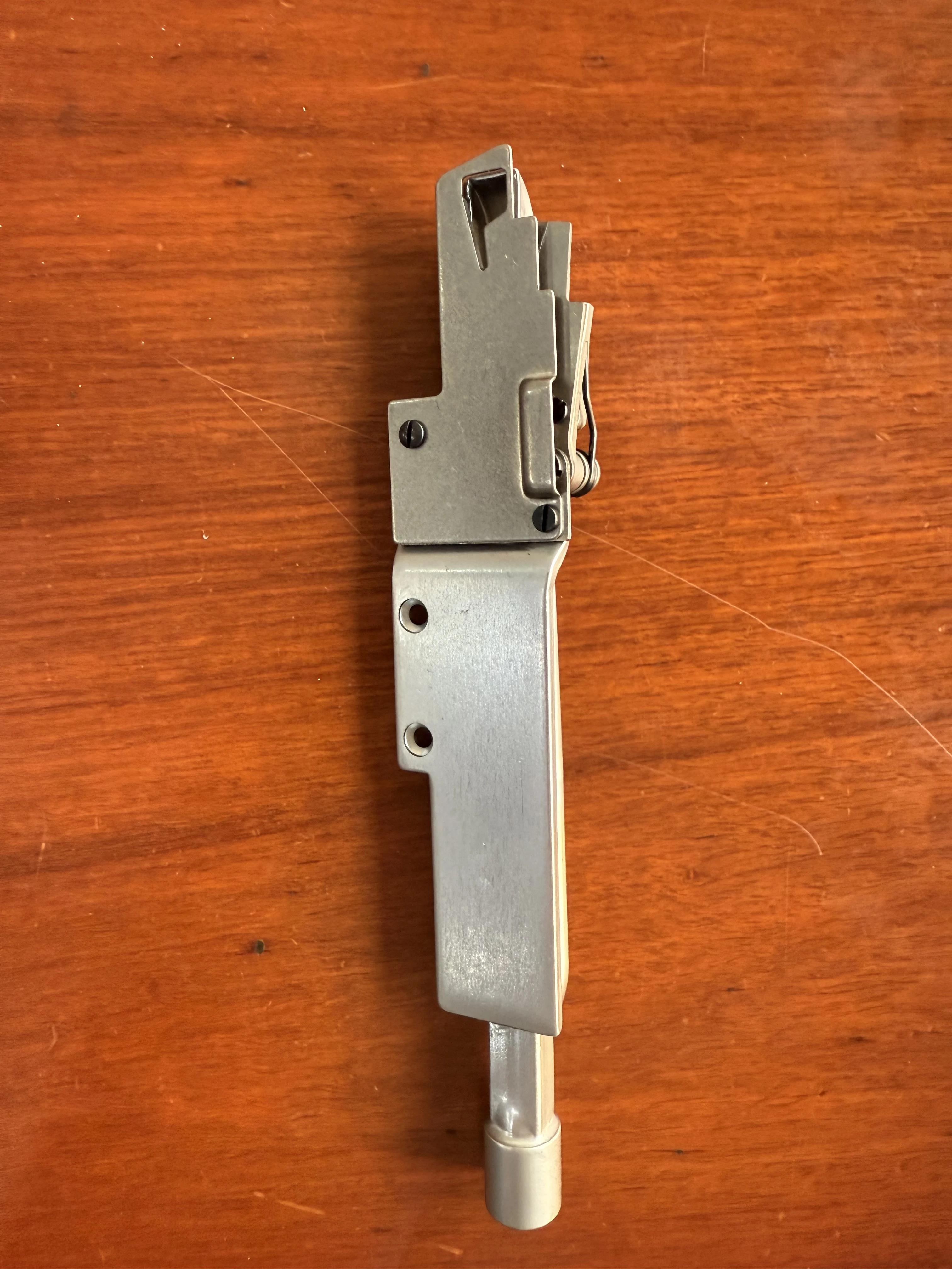 YAMATO 2121000 upper knife lever,thread trimmer device for AZ8000/8400/8003, Pegasus E256, industrial sewing machine parts
YAMATO 2121000 upper knife lever,thread trimmer device for AZ8000/8400/8003, Pegasus E256, industrial sewing machine parts
