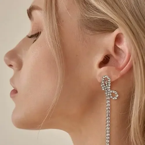 Temperament 925 Silver Needle Full Diamond Bow Tassel Earrings Personalized Diamond Silver Metal Earrings for Woman Jewelry Gift
Temperament 925 Silver Needle Full Diamond Bow Tassel Earrings Personalized Diamond Silver Metal Earrings for Woman Jewelry Gift