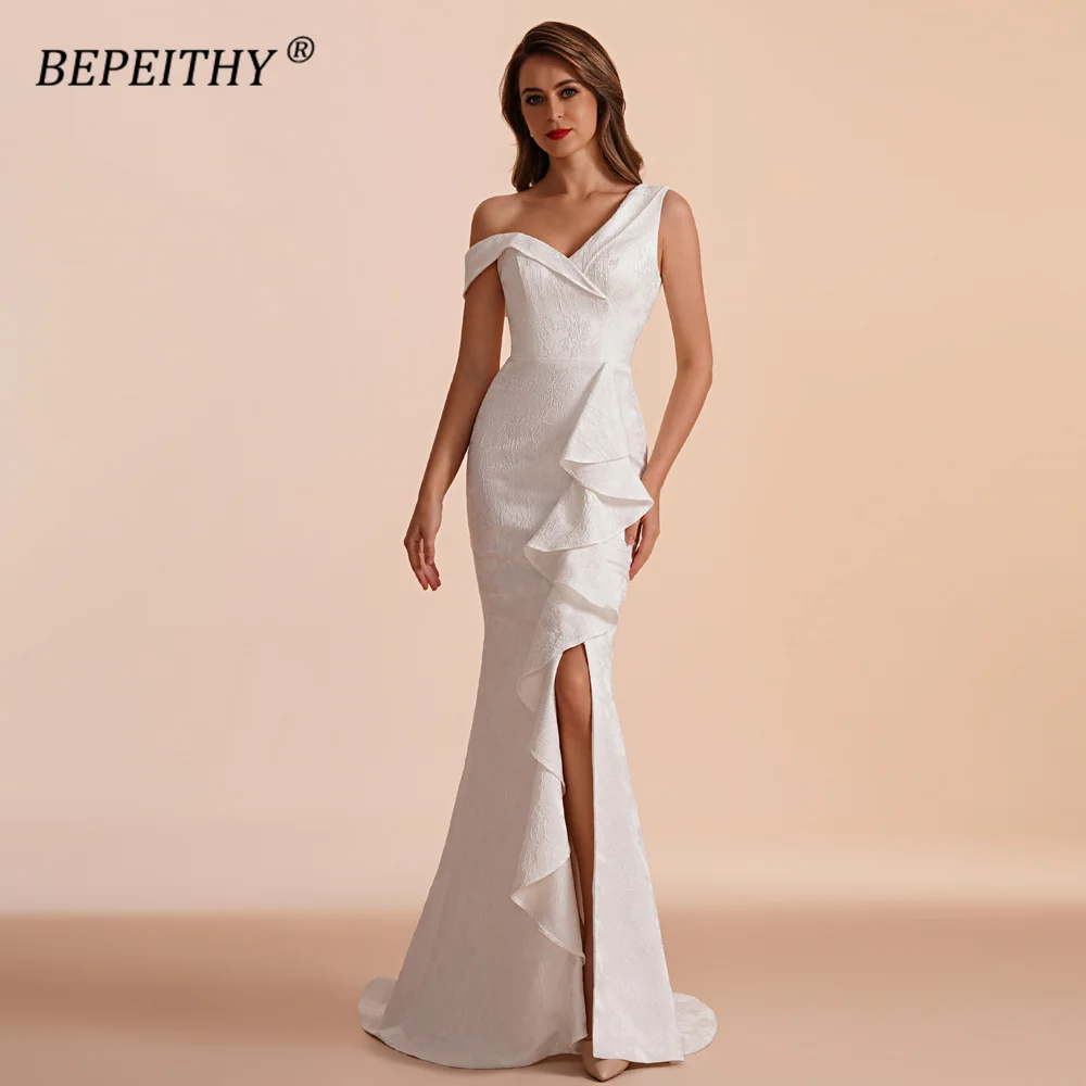 BEPEITHY Ivory One Shoulder Mermaid Long Evening Prom Dresses 2023 Spring Sleeveless Sexy High Slit Ruffle Skirt Party Gown New
BEPEITHY Ivory One Shoulder Mermaid Long Evening Prom Dresses 2023 Spring Sleeveless Sexy High Slit Ruffle Skirt Party Gown New
