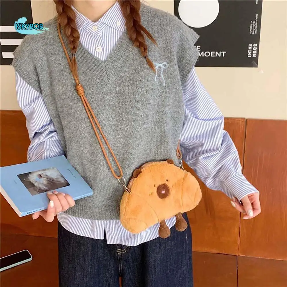 Cute Bread Capybara Shoulder Bag Lightweight Large Capacity Plush Croissant Crossbody Bag Soft Furry Creative Cartoon Pouch
Cute Bread Capybara Shoulder Bag Lightweight Large Capacity Plush Croissant Crossbody Bag Soft Furry Creative Cartoon Pouch