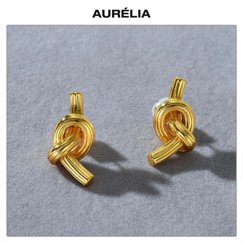 Fashion Brass Plated 18K Gold Knotted Earrings Woman Unique Jewelry Accessories
Fashion Brass Plated 18K Gold Knotted Earrings Woman Unique Jewelry Accessories