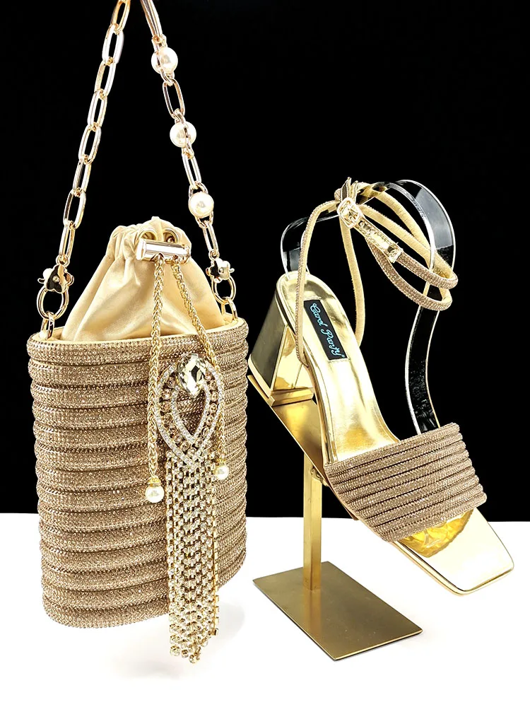 Handbag and high heel shoes set gold crown diamond tassel bag and open toe shoes double chains suitable for parties and wedding
Handbag and high heel shoes set gold crown diamond tassel bag and open toe shoes double chains suitable for parties and wedding
