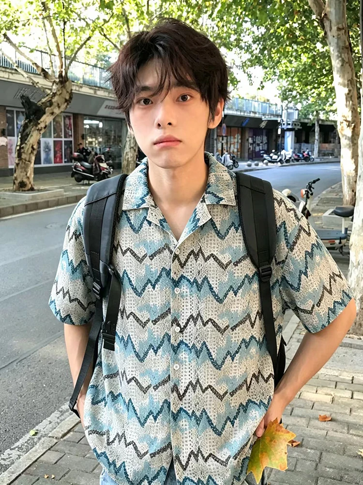 Men's Short Sleeve Shirt Hollow out Cuban Collar Wave Pattern Summer Vacation Sun Protection Casual Style Thin Outerwear
Men's Short Sleeve Shirt Hollow out Cuban Collar Wave Pattern Summer Vacation Sun Protection Casual Style Thin Outerwear