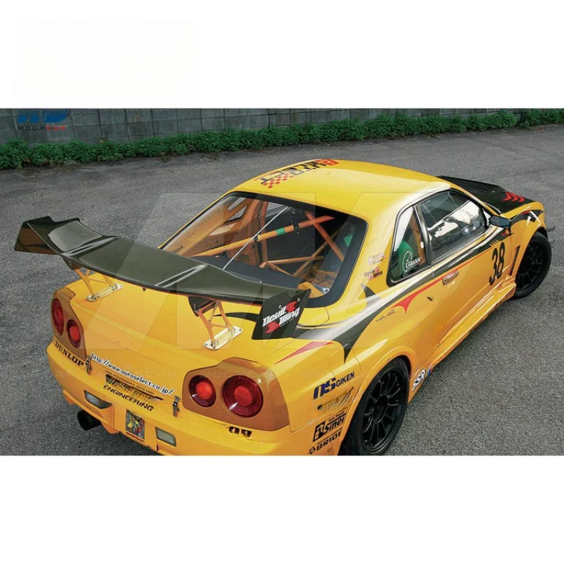 Задний спойлер из карбона в стиле Auto Select для Nissan R34 1999-2002 годов
Задний спойлер из карбона в стиле Auto Select для Nissan R34 1999-2002 годов