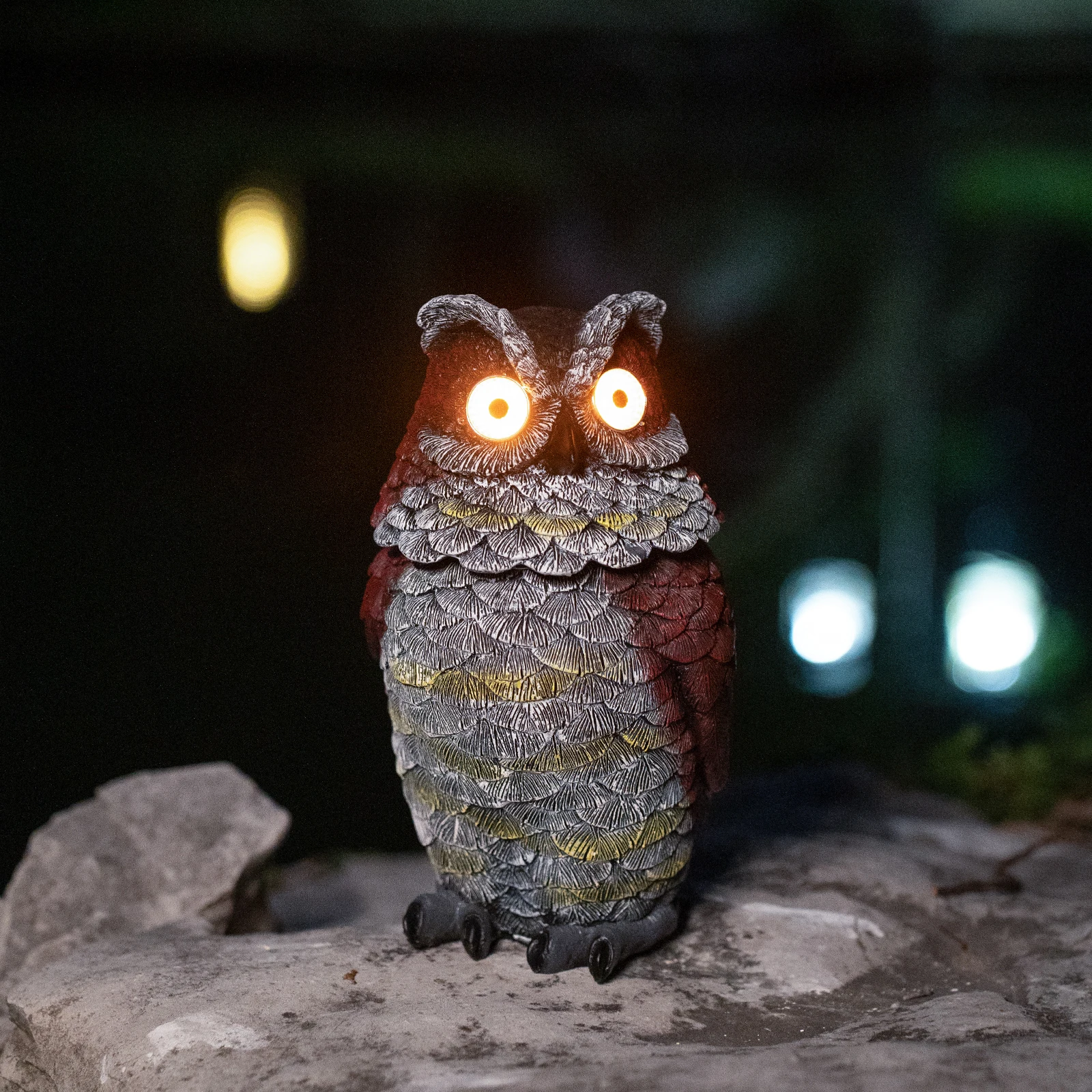 An outdoor courtyard garden solar-powered owl figment. Its eyes light up automatically when it gets dark and its head can sway l
An outdoor courtyard garden solar-powered owl figment. Its eyes light up automatically when it gets dark and its head can sway l