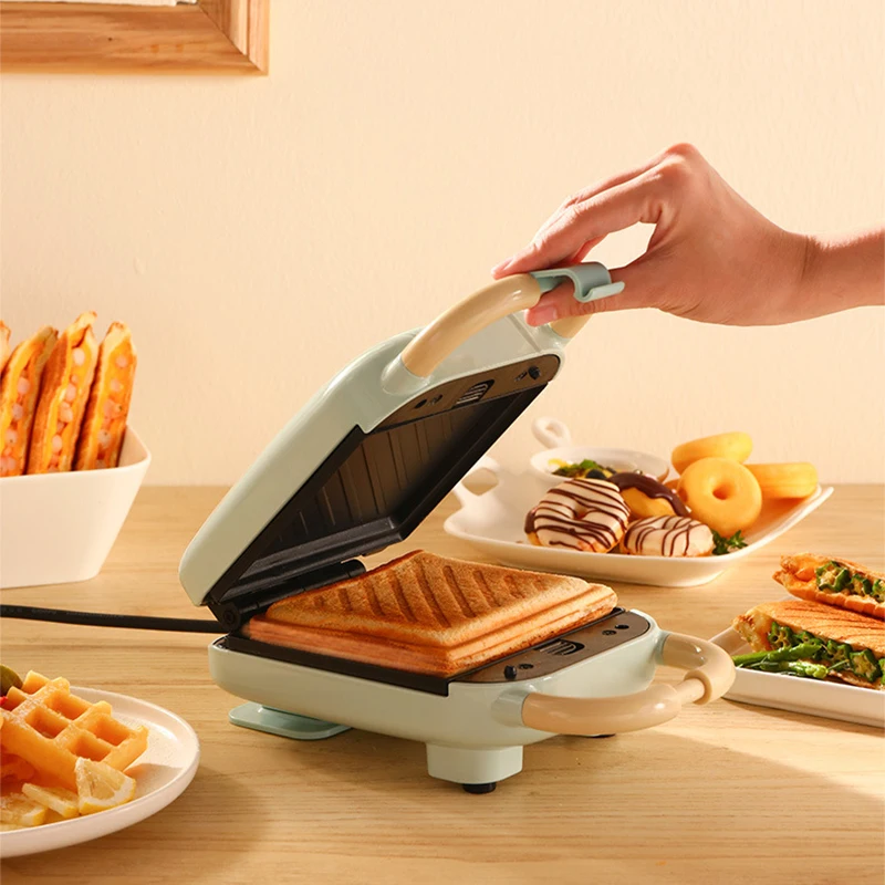YD-518S Sandwich Machine Breakfast Machine 650W Waffle machine Household Small multi-purpose Press Toast Toast machine
YD-518S Sandwich Machine Breakfast Machine 650W Waffle machine Household Small multi-purpose Press Toast Toast machine