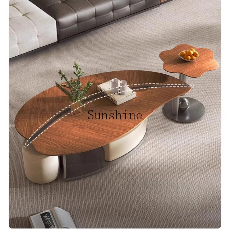 Modern light luxury solid wood coffee table special-shaped leaves high-end living room home creative belt pumping
Modern light luxury solid wood coffee table special-shaped leaves high-end living room home creative belt pumping
