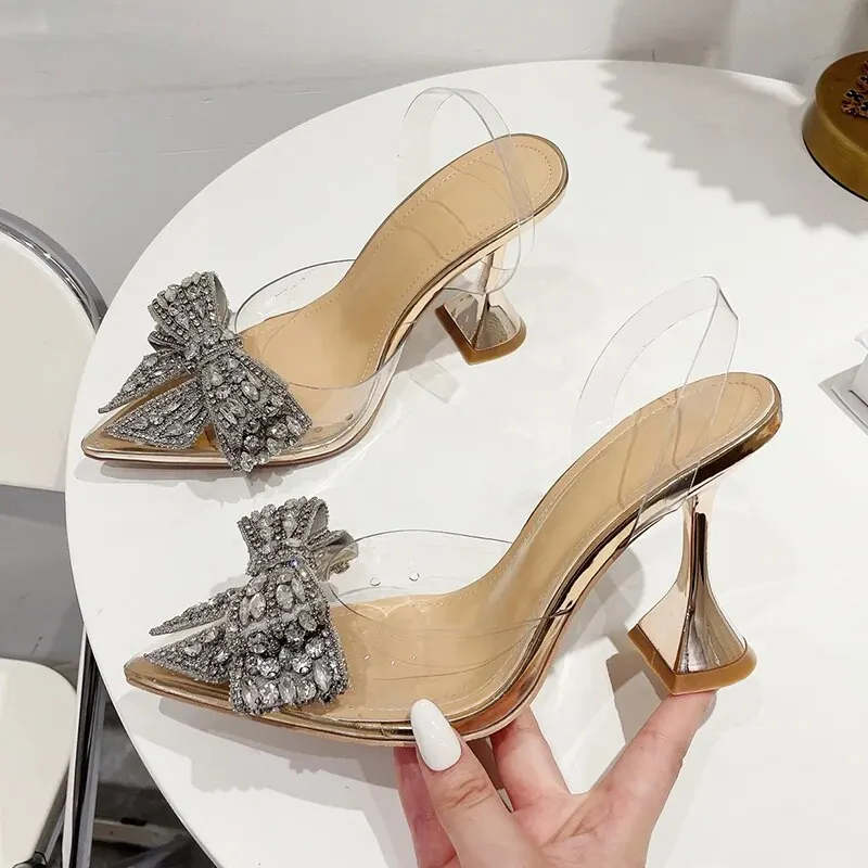 Fashion Crystal Sequined Bowknot Women Pumps Sexy Pointed Toe High Heels Wedding Prom Shoes Ladies PVC Transparent Sandals
Fashion Crystal Sequined Bowknot Women Pumps Sexy Pointed Toe High Heels Wedding Prom Shoes Ladies PVC Transparent Sandals