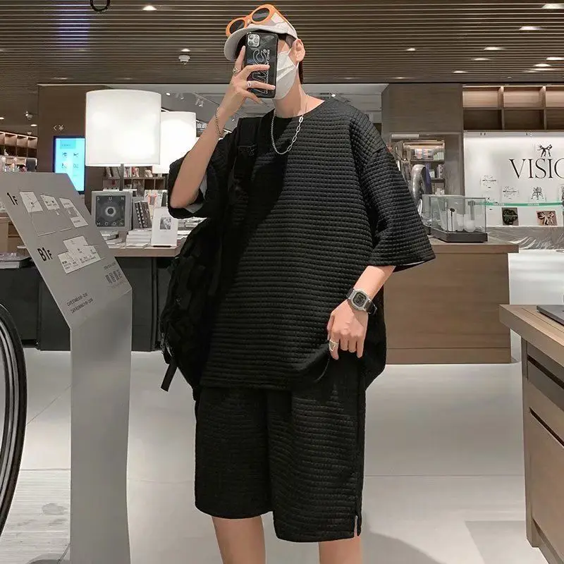 Popular Solid Color Couple Sportswear Set Men's Waffle Texture Shorts Loose Fit Summer Short Sleeve Outfit
Popular Solid Color Couple Sportswear Set Men's Waffle Texture Shorts Loose Fit Summer Short Sleeve Outfit