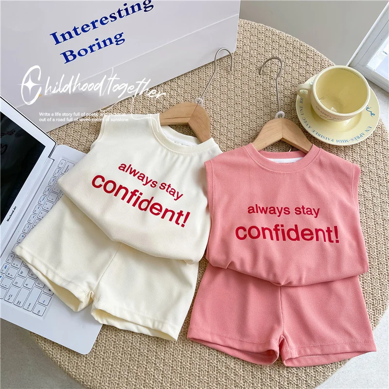 Baby Kids Summer Letters Print Clothing Set Girls Boys Sleeveless Waffle Tank Top And Solid Soft Cotton Shorts Fashion 2pcs Suit
Baby Kids Summer Letters Print Clothing Set Girls Boys Sleeveless Waffle Tank Top And Solid Soft Cotton Shorts Fashion 2pcs Suit