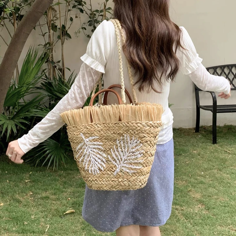 Handmade Tote Bag Large Capacity Raffia Straw Woven for Women Eco-friendly Beach Shoulder Handbag Embroidered White Leaf Fringe
Handmade Tote Bag Large Capacity Raffia Straw Woven for Women Eco-friendly Beach Shoulder Handbag Embroidered White Leaf Fringe