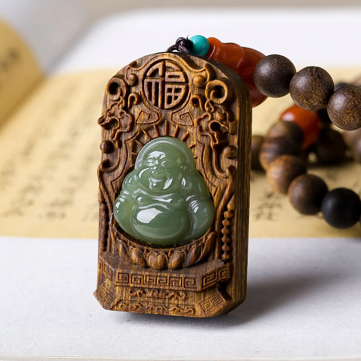Fusen red clay agalwood inlaid with natural Hotan Jade Buddha inscriptions, playa beads necklace made of magnesite and turquoise
Fusen red clay agalwood inlaid with natural Hotan Jade Buddha inscriptions, playa beads necklace made of magnesite and turquoise