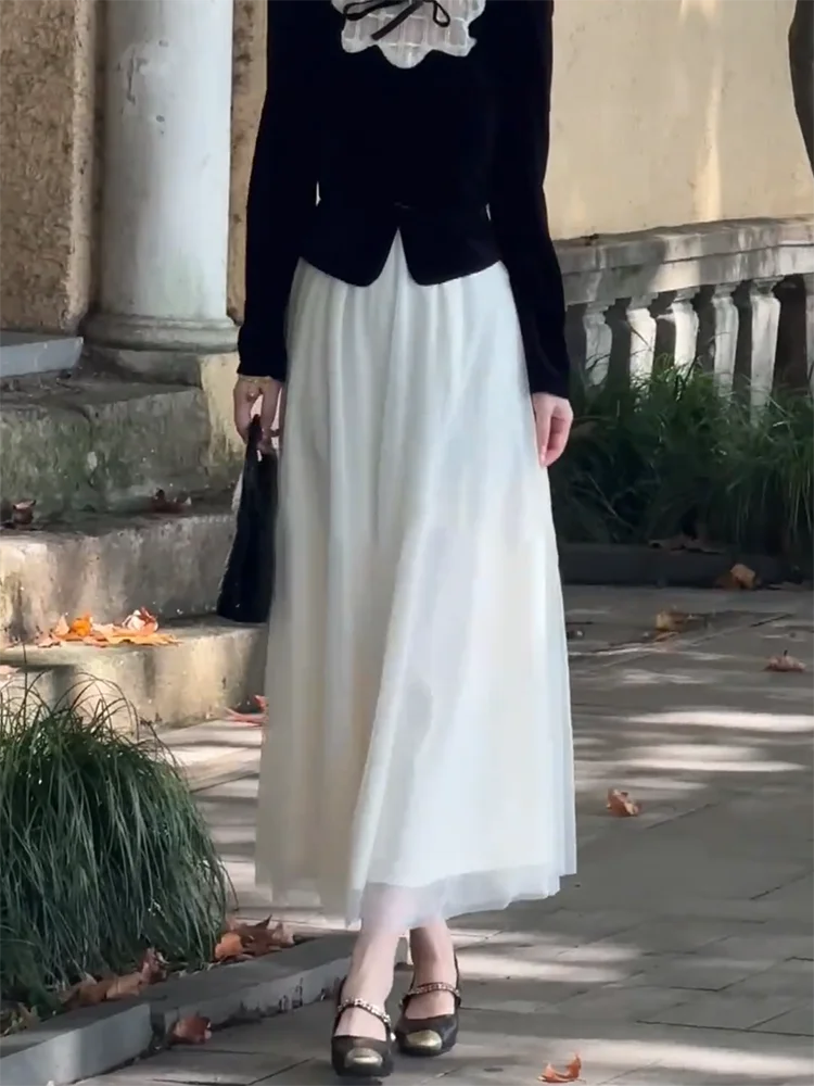 Элегантная белая юбка миди Ele Simple Gentle для женщин, осень-зима 2024, новая универсальная шифоновая юбка с высокой талией для больших размеров
Элегантная белая юбка миди Ele Simple Gentle для женщин, осень-зима 2024, новая универсальная шифоновая юбка с высокой талией для больших размеров