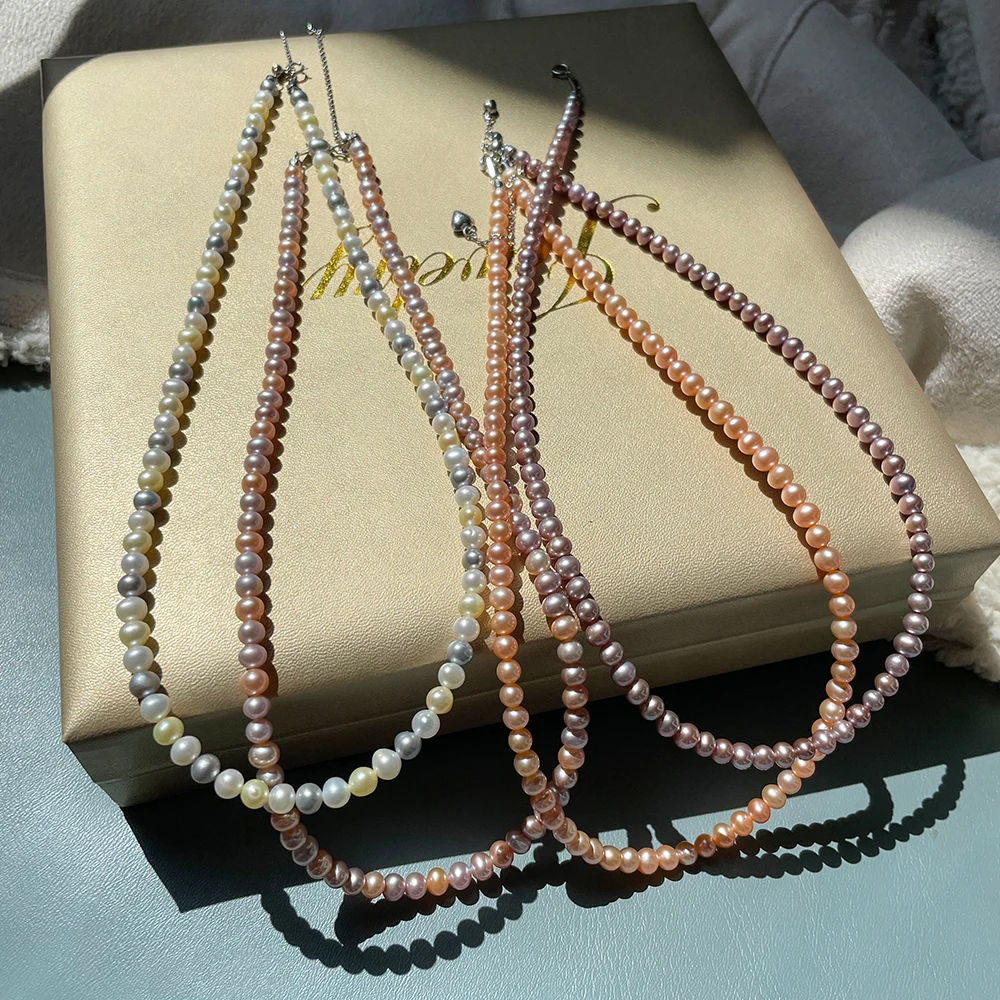 Genuine Freshwater Pearl Necklace - Natural Round Pearls 4-5mm, 17" Sterling Silver Clasp PN072
Genuine Freshwater Pearl Necklace - Natural Round Pearls 4-5mm, 17" Sterling Silver Clasp PN072