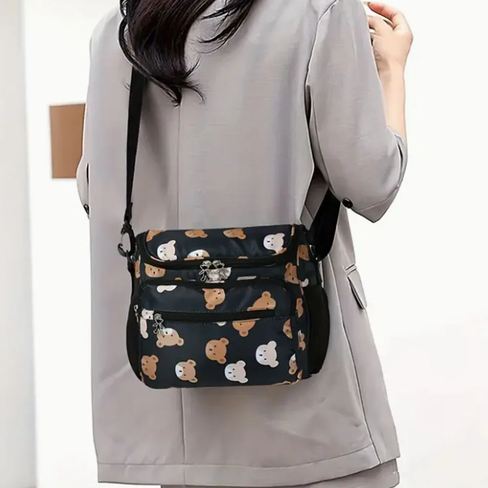 Многофункциональная новая нейлоновая сумка для мамы | Сумка для подгузников большой вместимости, удобная дорожная, подвесная коляска, сумка через плечо 
Многофункциональная новая нейлоновая сумка для мамы | Сумка для подгузников большой вместимости, удобная дорожная, подвесная коляска, сумка через плечо