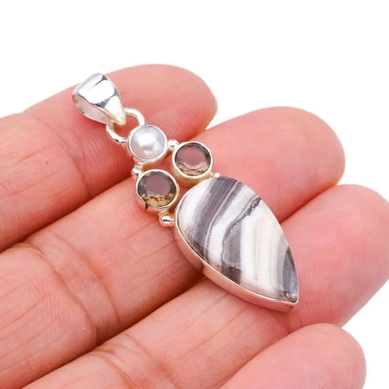 Hesy® Natural Zebra Calcite Smoky Quartz And River PearlHandmade 925 Sterling Silver Pendant 1.75" F4570
Hesy® Natural Zebra Calcite Smoky Quartz And River PearlHandmade 925 Sterling Silver Pendant 1.75" F4570