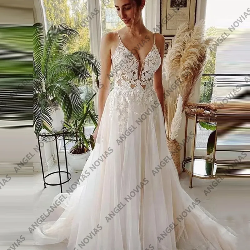 Long Boho Beach Wedding Dresses with Spaghetti Straps Lace Appliques Wedding Gown Vestidos De Novia boda
Long Boho Beach Wedding Dresses with Spaghetti Straps Lace Appliques Wedding Gown Vestidos De Novia boda