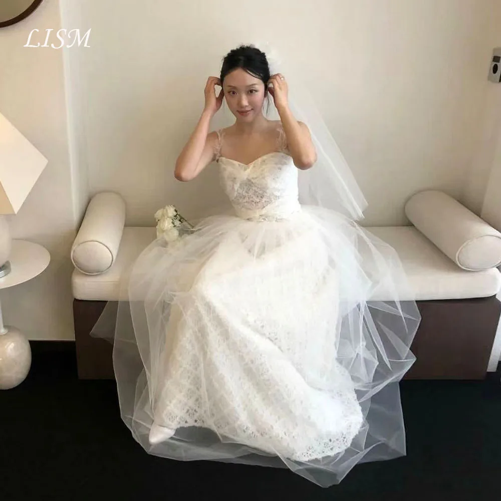 Lism Luxury Wedding Dress with Veil Spaghetti Straps Ivory Lace A-Line Korea Photo shoot Bridal Reception Gown Custom Made 2026
Lism Luxury Wedding Dress with Veil Spaghetti Straps Ivory Lace A-Line Korea Photo shoot Bridal Reception Gown Custom Made 2026