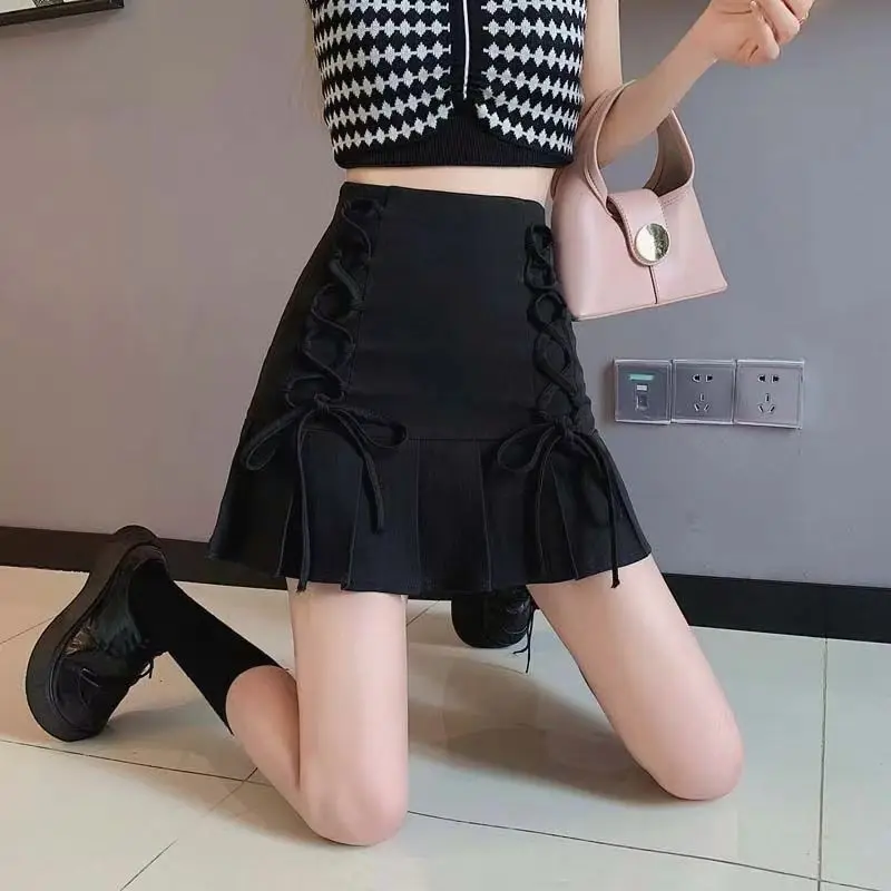 Spring and summer new high waisted short skirt design with butterfly bow A-line skirt solid color pleated skirt
Spring and summer new high waisted short skirt design with butterfly bow A-line skirt solid color pleated skirt