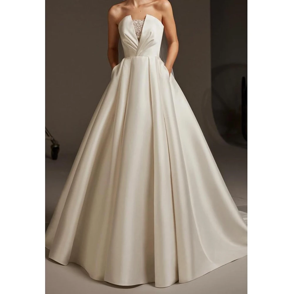 CustomizedElegant and Formal Lace A-Line Solid Color Satin Buttons Back Wedding Dresses Appliques Sweep Train Strapless Sleevele
CustomizedElegant and Formal Lace A-Line Solid Color Satin Buttons Back Wedding Dresses Appliques Sweep Train Strapless Sleevele