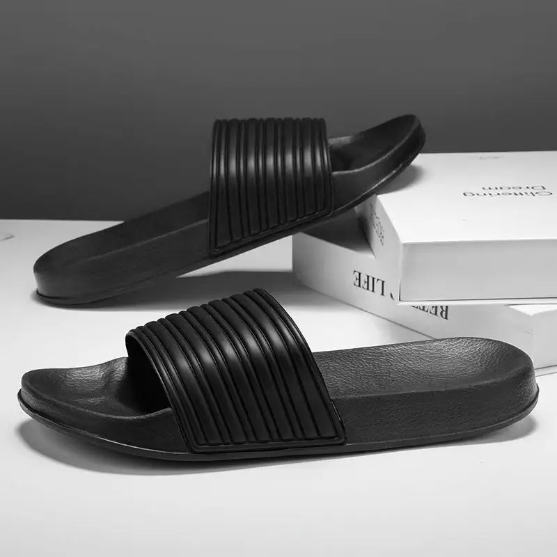 Новые летние мужские тапочки большого размера с одним словом для влюбленных, мягкая подошва, нескользящие светлые белые домашние тапочки, тапочки для ванной, пляжные тапочки
Новые летние мужские тапочки большого размера с одним словом для влюбленных, мягкая подошва, нескользящие светлые белые домашние тапочки, тапочки для ванной, пляжные тапочки