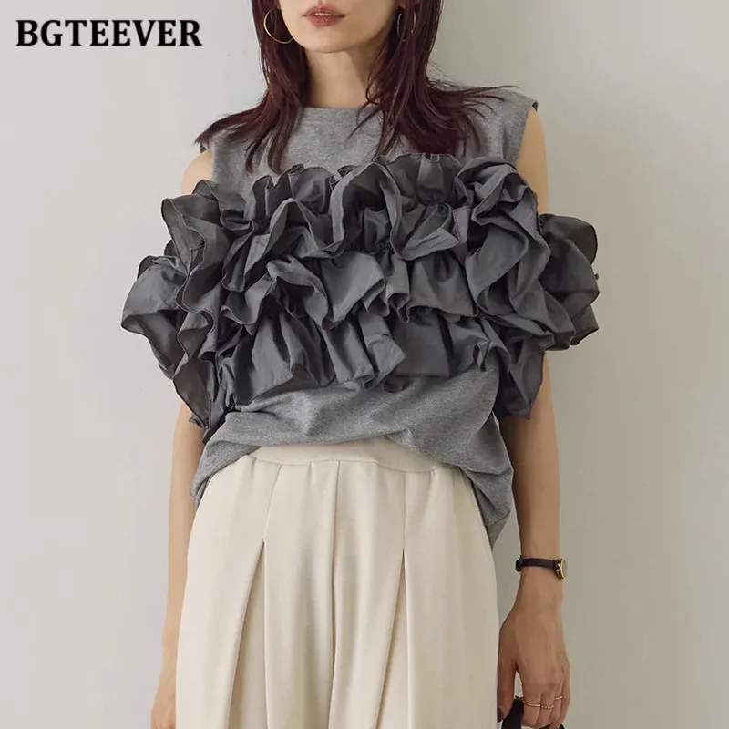 BGTEEVER Summer O-neck Ladies Ruffles Blouses Loose Short Sleeve Hollow Out Female T-shirts Tops 
BGTEEVER Summer O-neck Ladies Ruffles Blouses Loose Short Sleeve Hollow Out Female T-shirts Tops