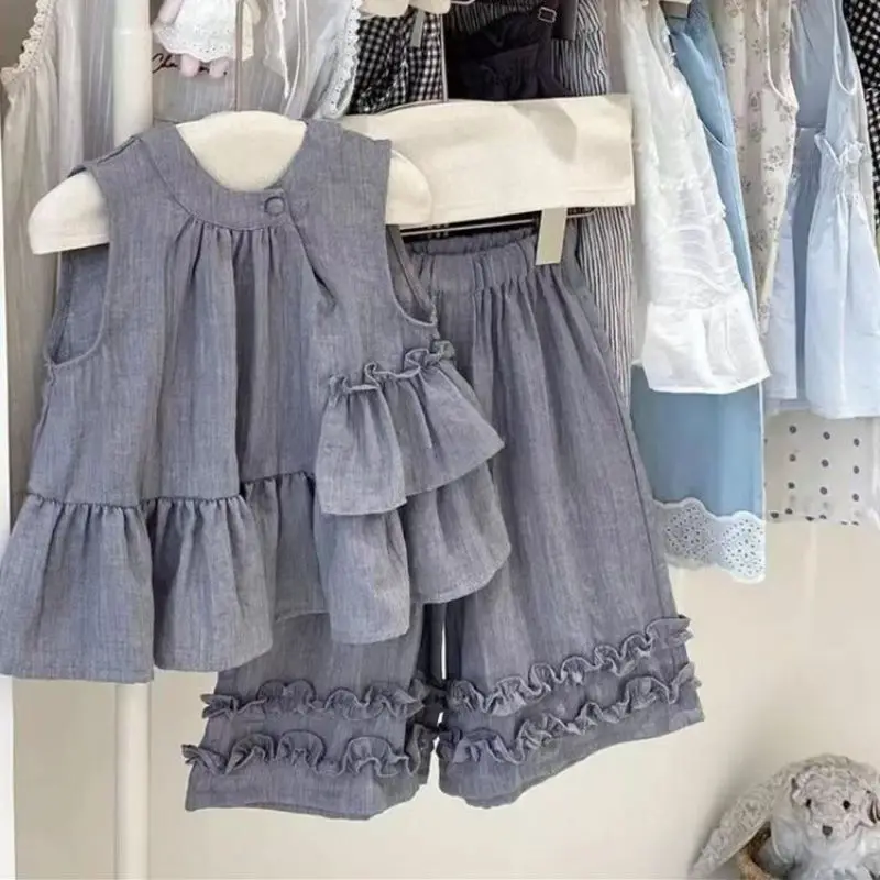 Girls Summer Outfit Set - Blue-Grey Ruffle Sleeveless Top + Wide Leg Pants (Korean Linen-Cotton Blend) baby girl clothes1-13Y
Girls Summer Outfit Set - Blue-Grey Ruffle Sleeveless Top + Wide Leg Pants (Korean Linen-Cotton Blend) baby girl clothes1-13Y