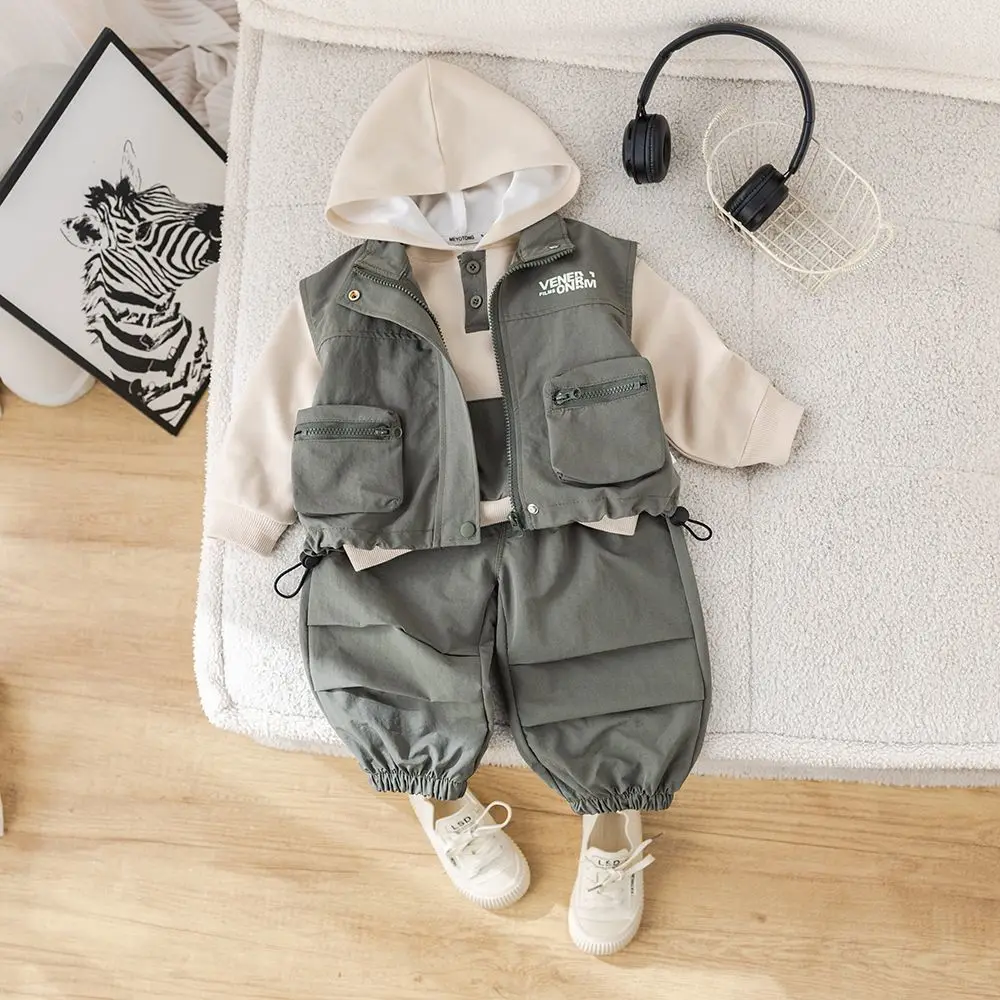 Spring and Autumn Children's Clothing Set Fashion New Style Boys' Three Piece Pocket Vest Hoodie Pants Set
Spring and Autumn Children's Clothing Set Fashion New Style Boys' Three Piece Pocket Vest Hoodie Pants Set