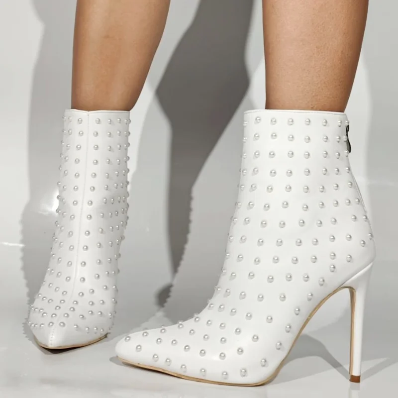 Современные ботильоны с острым носком и шипами, белые кожаные женские короткие ботильоны из искусственной кожи с молнией сзади на тонком каблуке, большие размеры 45,
Современные ботильоны с острым носком и шипами, белые кожаные женские короткие ботильоны из искусственной кожи с молнией сзади на тонком каблуке, большие размеры 45,