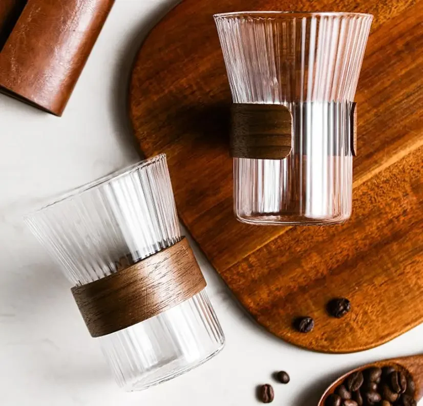 Glass Coffee Cups Japanese Style Tea Cup With Walnut Cup Sleeve Wine Glasses Simple Striped Mugs Beer Milk Juice Water Mug
Glass Coffee Cups Japanese Style Tea Cup With Walnut Cup Sleeve Wine Glasses Simple Striped Mugs Beer Milk Juice Water Mug