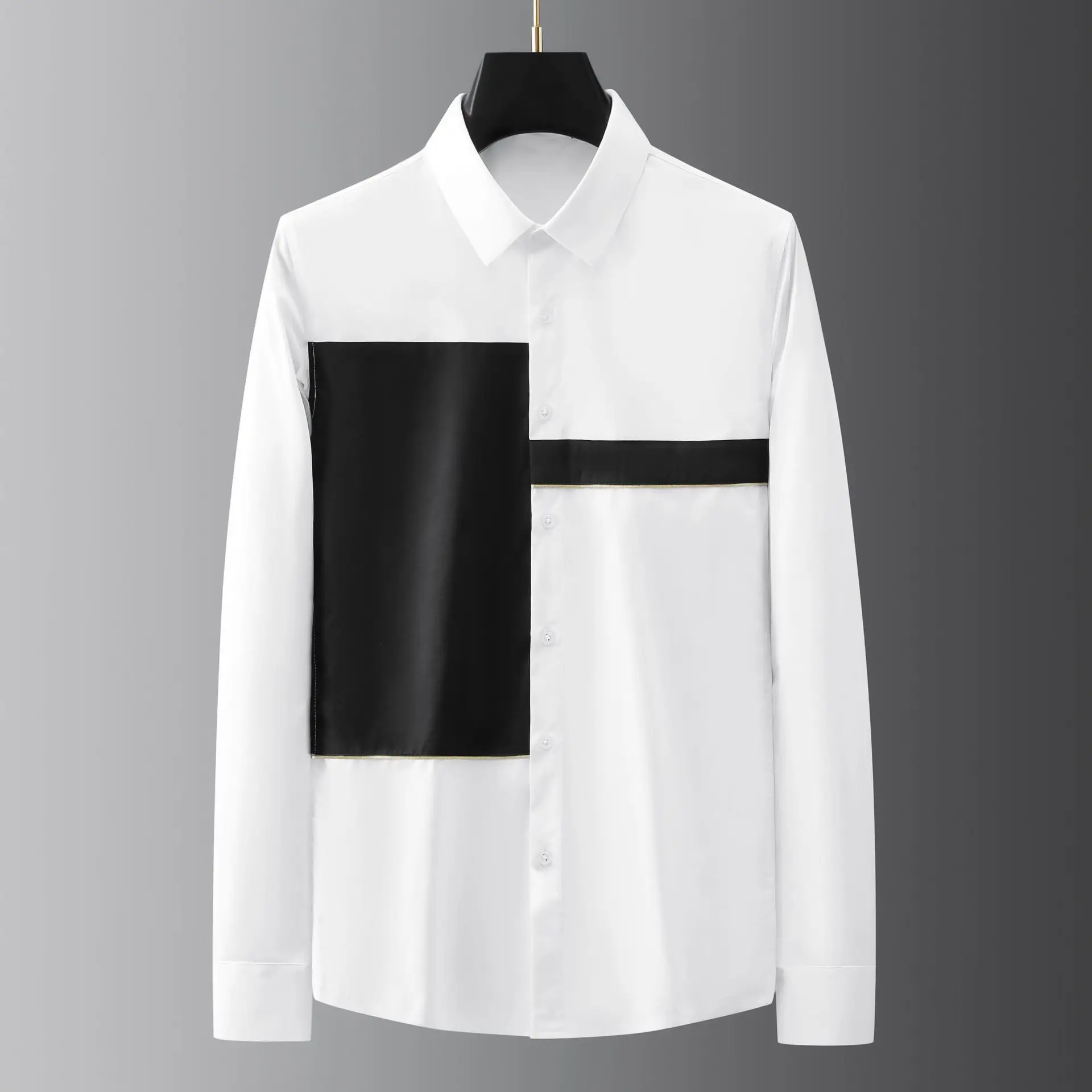 Geometric black and white patchwork long sleeved shirt with slim fitting gold thread decoration for fashionable men's clothing
Geometric black and white patchwork long sleeved shirt with slim fitting gold thread decoration for fashionable men's clothing
