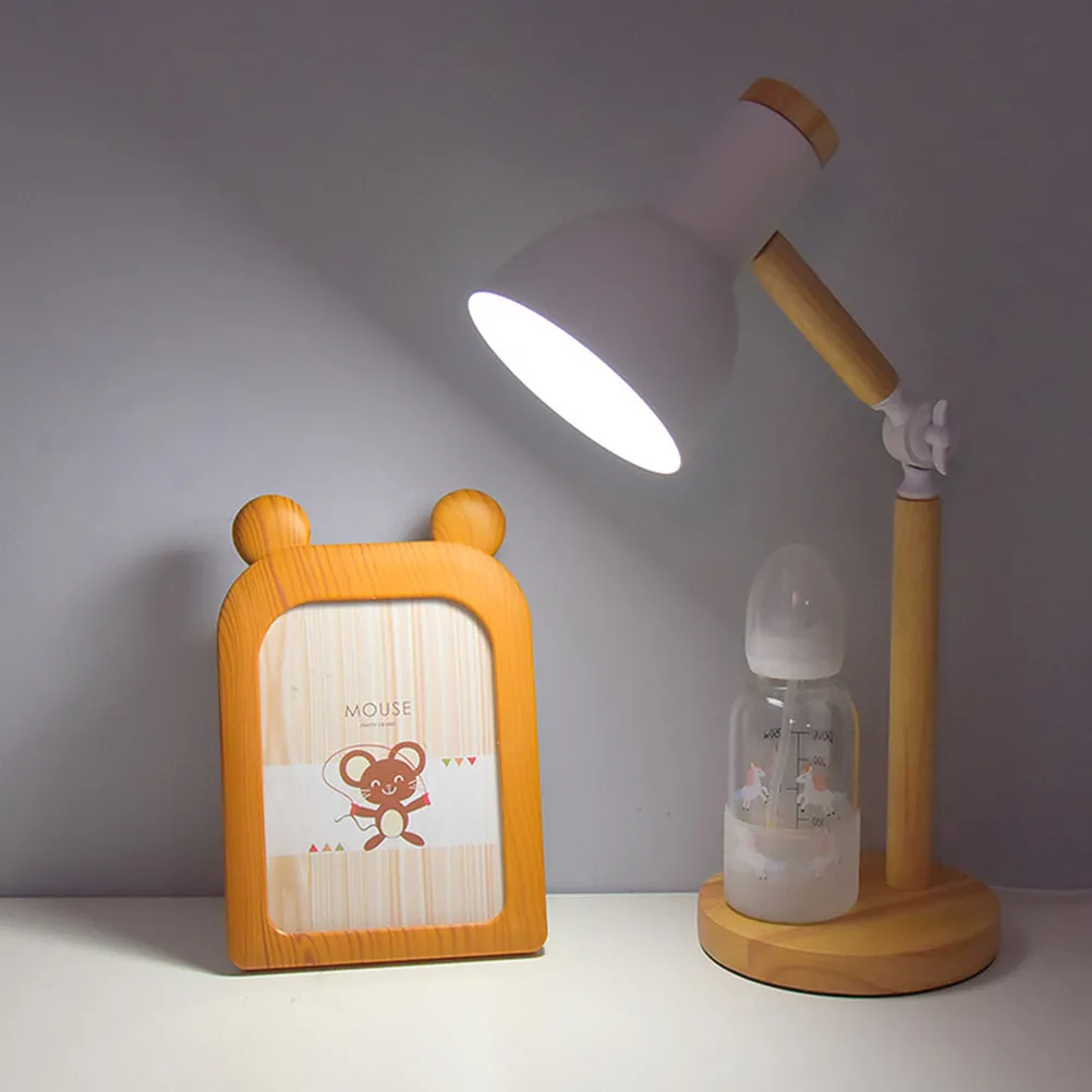 Nordic Style Wooden Iron Desk Lamp Adjustable Reading Light for Bedroom Office Study Room Living Room Decorative Table Light LED
Nordic Style Wooden Iron Desk Lamp Adjustable Reading Light for Bedroom Office Study Room Living Room Decorative Table Light LED