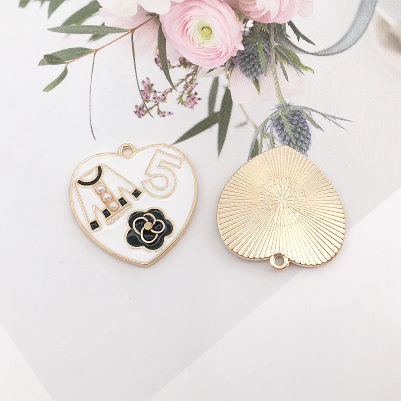 100pcs 24mm Love heart clothes number 5 pearl Jewelry Accessories Inlaid Jewelry Jewelry Diy Material
100pcs 24mm Love heart clothes number 5 pearl Jewelry Accessories Inlaid Jewelry Jewelry Diy Material