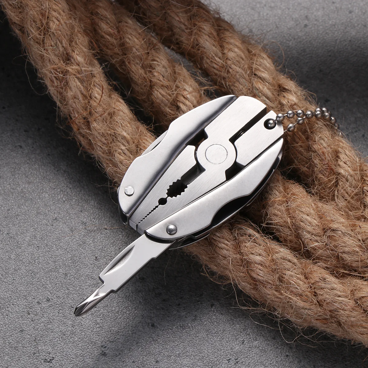 Mini Multifunction Tool Pliers Stainless Steel Folding Pocket Multi-Tool For Outdoor Camping Hiking Survival Keychain
Mini Multifunction Tool Pliers Stainless Steel Folding Pocket Multi-Tool For Outdoor Camping Hiking Survival Keychain