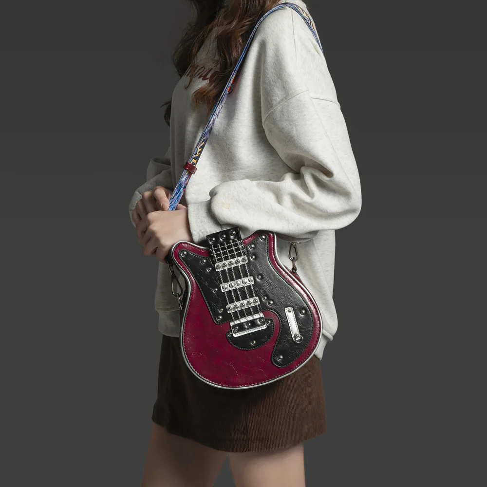 Designer New Product Guitar Shape Crossbody Bag Fashion Leather Luxury Shoulder Bag High Quality Music Theme Purse For Women
Designer New Product Guitar Shape Crossbody Bag Fashion Leather Luxury Shoulder Bag High Quality Music Theme Purse For Women