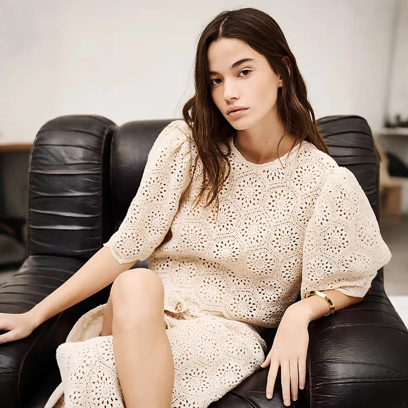 Elegant Hollow out Knitted Sweater in Beige Front And Back Wearable Half Skirt Fashionable Women's Ensemble
Elegant Hollow out Knitted Sweater in Beige Front And Back Wearable Half Skirt Fashionable Women's Ensemble