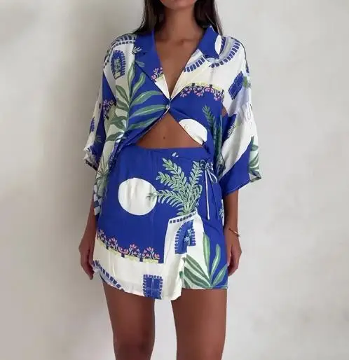 Summer Fashion Graffiti Printed Lapel Casual Shirt and High Waisted Lace Up Pants Skirt Set for Women's Casual Loose 2-Piece Set
Summer Fashion Graffiti Printed Lapel Casual Shirt and High Waisted Lace Up Pants Skirt Set for Women's Casual Loose 2-Piece Set