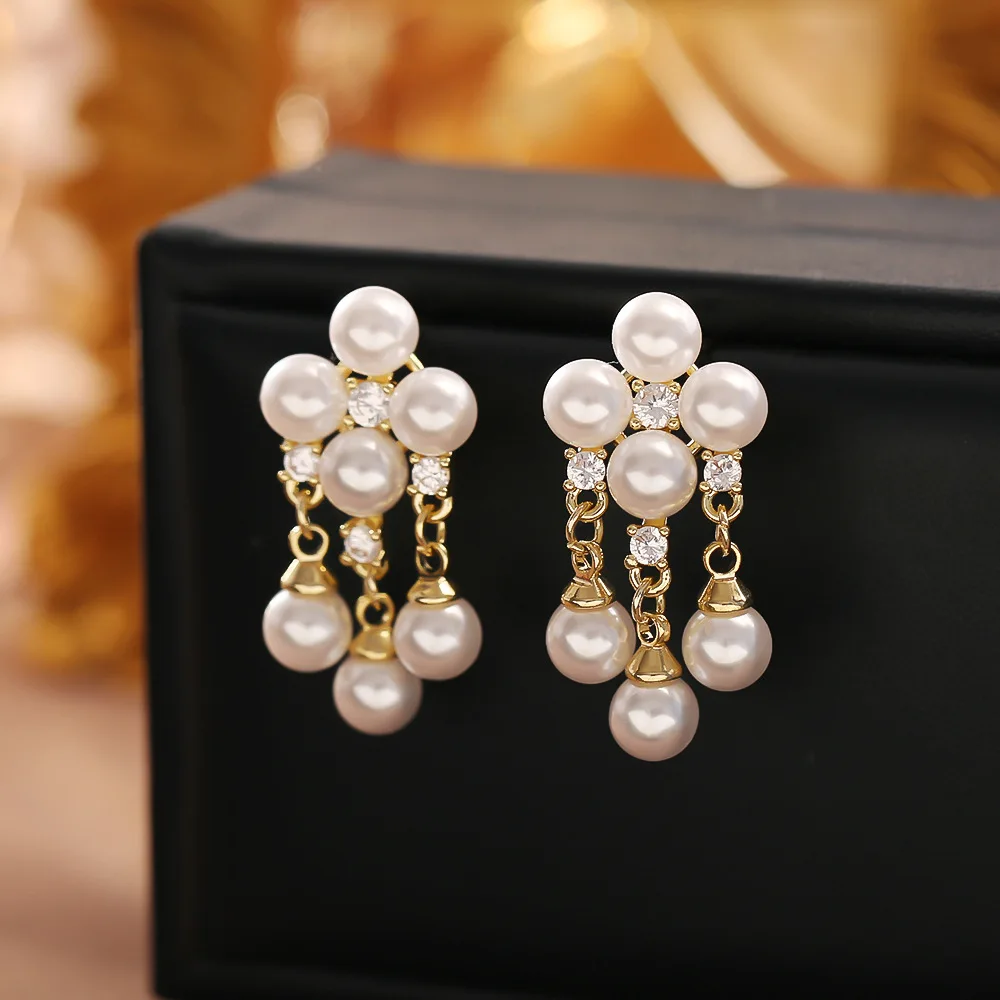 Fashionable and exquisite pearl tassel earrings, high-end, temperament and versatile earrings, niche design, commuter earrings
Fashionable and exquisite pearl tassel earrings, high-end, temperament and versatile earrings, niche design, commuter earrings
