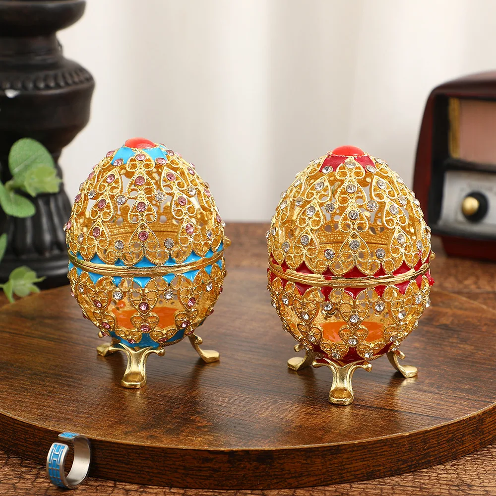 Enamel Inlaid Diamond Jewelry Box with Hollowed Out Easter Egg Shaped Home Crafts Ornaments Alloy Decorative Storage Box
Enamel Inlaid Diamond Jewelry Box with Hollowed Out Easter Egg Shaped Home Crafts Ornaments Alloy Decorative Storage Box